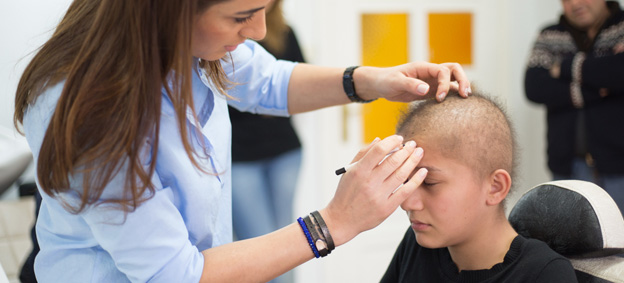 Prosthetic hair outlet piece